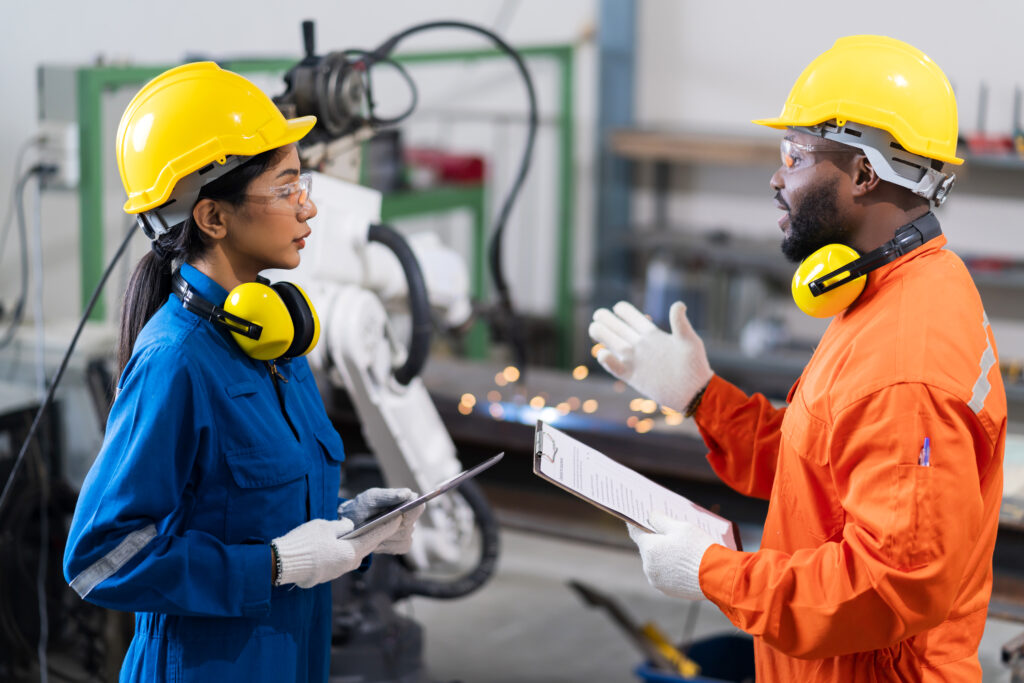 engineer-cooperation-male-female-technician-maintenance-control-relay-robot-arm-system-welding-with-tablet-laptop-control-quality-operate-process-work-heavy-industry-40-manufacturing-factory(1)